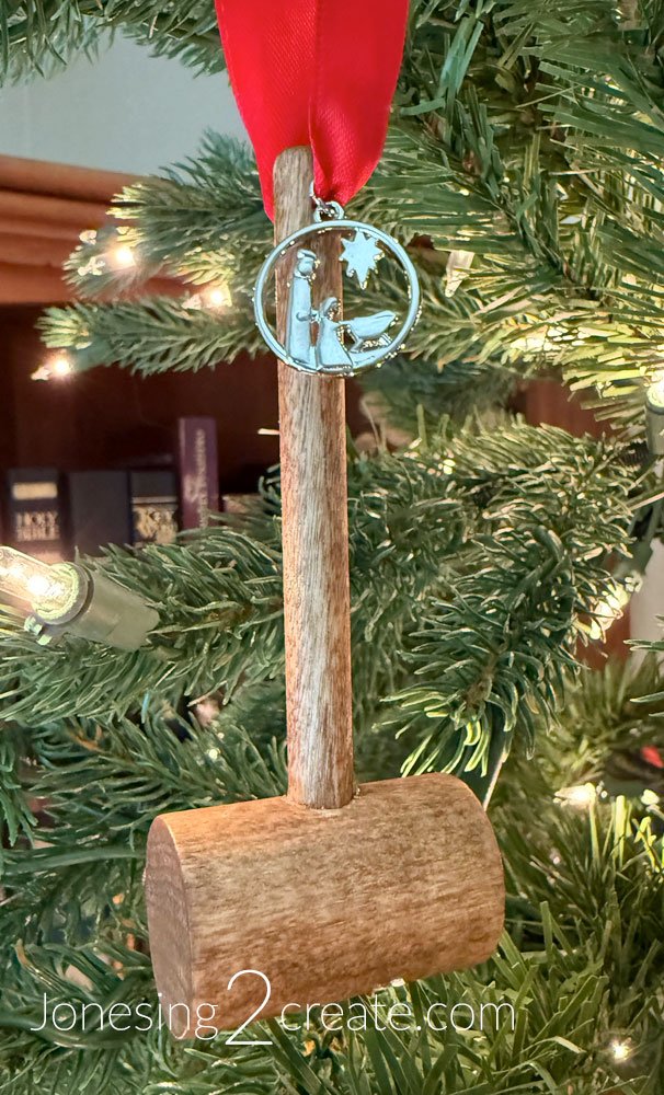 Joseph's Christ-Centered Christmas Ornament - with red ribbon hammer ornament right side down